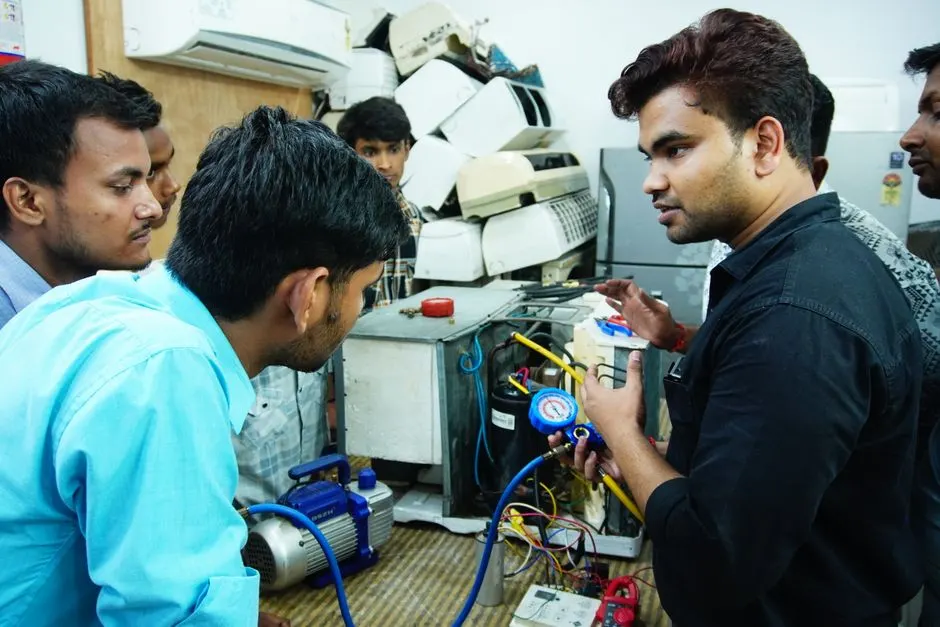Experienced Appliance repair professionals at work